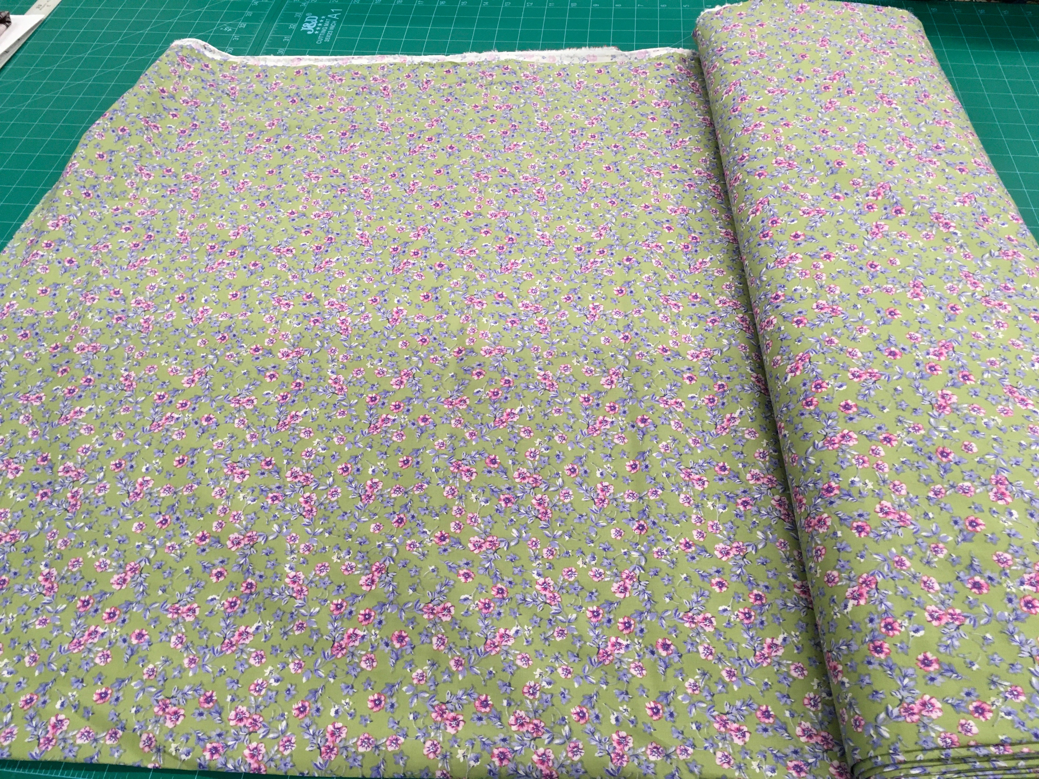 Pink Purple Small Flowers Green Background 56 inch Cotton Fabric