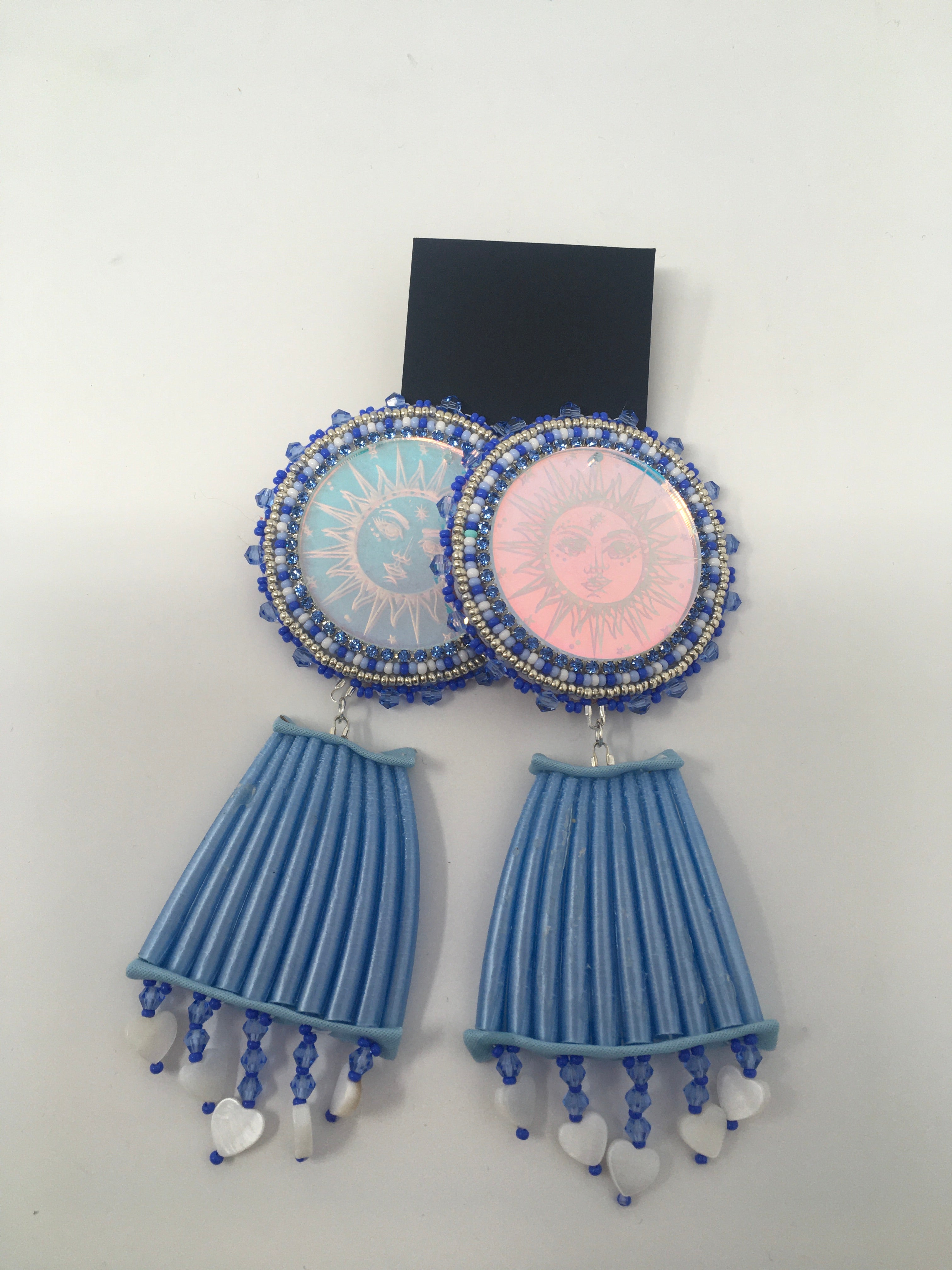 Sunny Poloz blue sun earrings with blue dentalium dangles